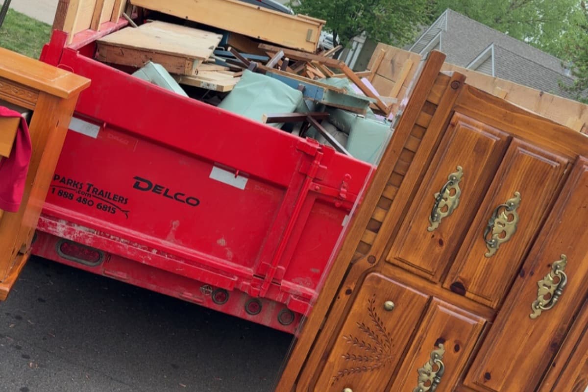 Furniture removal — old furniture loaded onto trailer